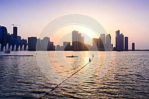 Panoramic view of Sharjah waterfront in UAE at sunset