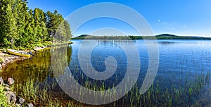 Panoramic view at Siebdniesjavrrie lake in Swedish Lapland. Vasterbotten county, Norrland, Sweden photo