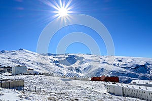 panoramic view of sierra nevada, hotels and high performance sports center in the mountains