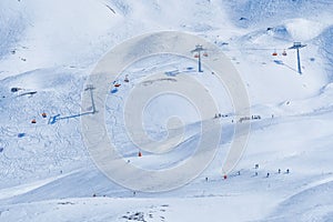 Panoramic view of ski chair lift in high mountains in Switzerland