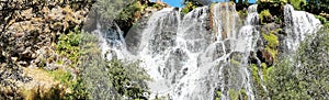Panoramic view of a small waterfall in the mountains of Armenia.