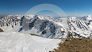 Panoramic view of snowy alps mountains in beautiful sunny winter nature