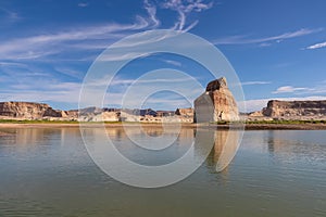 Panoramic view on solitary rock formations Lone Rock in Wahweap Bay in Lake Powell in Glen Canyon Recreation Area, Page