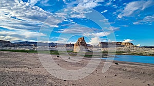 Panoramic view on solitary rock formations Lone Rock in Wahweap Bay in Lake Powell in Glen Canyon Recreation Area, Page