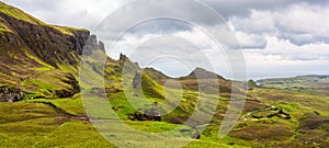 Panoramic view of the spectacular and strange landscape of the Quiraing Mountains on the Isle of Skye, Scotland.