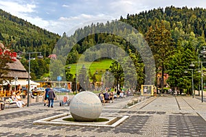 Panoramic view of St. Jacob square, plac Sw. Jakuba, in Szczyrk mountain resort of Beskidy Mountains in Silesia region of Poland