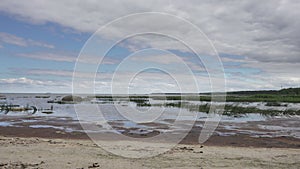 Panoramic view of the stony coast of the Gulf of Finland in sunny summer day