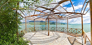 Panoramic view of summer wooden terace of luxury vila on coast of Ohrid