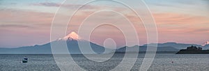 Panoramic view of the sunet over Lake Llanquihue and snow covered Osorno Volcano, Puerto Varas, Patagonia, Chile