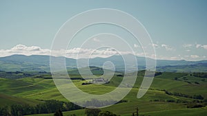 Panoramic view of sunny spring day in Italian rural landscape of Tuscany, in Chianti region