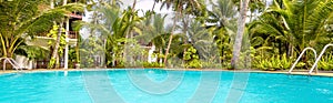 Panoramic view of sunny tropical hotel