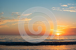 Panoramic view of sunset over ocean. Beautiful serene scene. Sea sky concept, sunrise colors clouds. Nature landscape