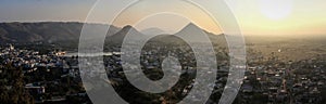 Panoramic view at sunset of Pushkar and the Aravalli hills from the Pap Mochani Gayatri Temple, Pushkar, Rajasthan, India