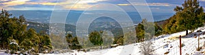 Panoramic view of the sunset from the snow-covered Adir mountain near the Matat settlement in Israel photo