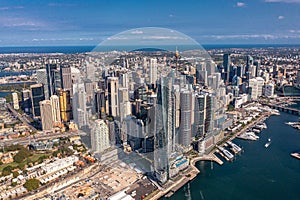 Panoramic view of Sydney. Drone photo of modern city buildings, skyscrapers, streets. Australia