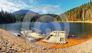 Panoramic view of Synevir high altitude lake at autumn day.