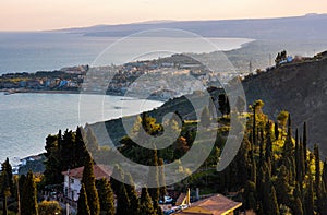 Panoramic view of Taormina shore at Ionian sea with Giardini Naxos and Villagonia towns in Messina region of Sicily in Italy