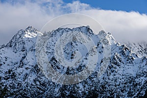 Panoramic view of Tatra mountains in Slovakia covered with snow