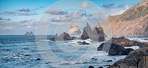 A Panoramic View of Tenerife's Rugged Coastline with a Photogenic Couple