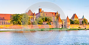 Panoramic view of the Teutonic Order Castle in Malbork during sunset
