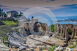Panoramic view of the theater of taormina and mediterranean back photo