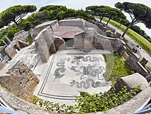 Panoramic view of the thermal baths of Neptune in the archaeological excavations of Ostia Antica with the famous mosaic depicting