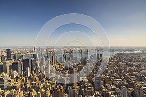 Panoramic view till down with of Empire State Building on skyscrapers buildings Manhattan. New York,