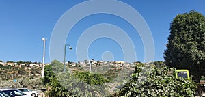 Panoramic view to the houses of Zichron Yaacov and kibbutz Maayan Zvi in Israel, 2019, summer time