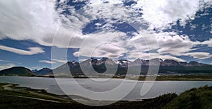 Panoramic view to lake, mountains and Ushuaia town