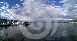 Panoramic view to marina bay with numerous boats and almost vert