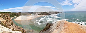 Panoramic view to Praia de Odeceixe, Surfer beach on the West coast of Algarve, District Aljezur Portugal photo