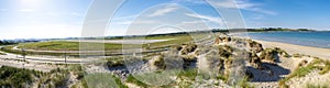 Panoramic view to Sola airport runaway near the white sand beach strip