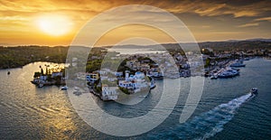Panoramic view to the town of Porto Cheli, Greece, during sunset time photo