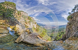 Panoramic view from top of the Uchan-su waterfall, that falls from the high rock mountain Ah-Petri in Crimea near Yalta. The