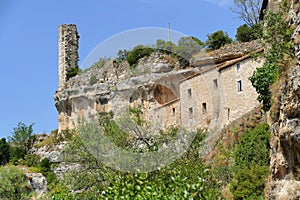Tower of the old medieval castle overlooking the village of Minerve