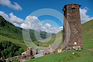 Panoramic view on traditional ancient Svan towers and surrounding hills in Ushguli, Svaneti, Georgia