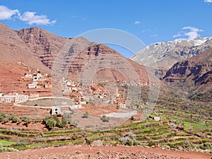 Panoramic view of traditional Berber village in Ourika Valley, High Atlas Mountains, Morocco.