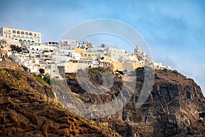 Panoramic view Traditional famous white houses and churches in Thira town on Santorini island, Greece