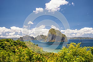 Panoramic view of tropical Palawan and unique Pinagbuyutan island on horizon. El Nido-Philippines Southeast Asia Bacuit