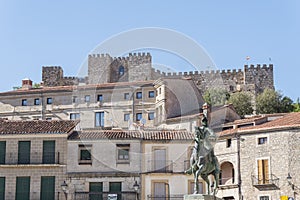 Panoramic view from Trujillo main square. Statue of Francisco Pisarro and Castle (Trujillo, Caceres, Spain