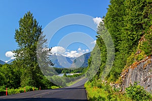 Panoramic View: Typical Canada: Beautiful canadian landscape - Road leads through beautiful forest