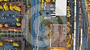 Panoramic view of typical suburb autumn landscape on American small apartment complex a near the road and railway