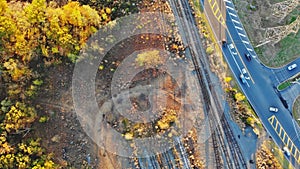 Panoramic view of typical suburb autumn landscape on near the road and railway