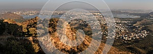 Panoramic view of Udaipur city, lakes, palaces and surrounding countryside from the monsoon palace, Udaipur, Rajasthan