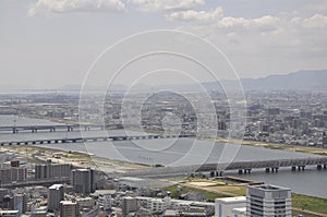 Panoramic view of urban architecture from Umeda Sky Tower of Osaka City in Japan