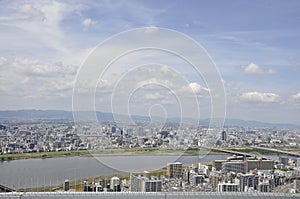 Panoramic view of urban architecture from Umeda Sky Tower of Osaka City in Japan