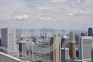 Panoramic view of urban architecture from Umeda Sky Tower of Osaka City in Japan