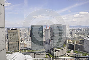 Panoramic view of urban architecture from Umeda Sky Tower of Osaka City in Japan