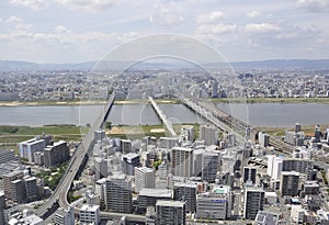 Panoramic view of urban architecture from Umeda Sky Tower of Osaka City in Japan