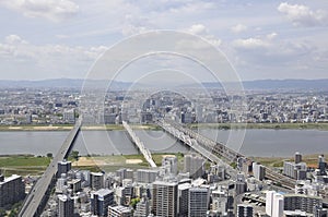 Panoramic view of urban architecture from Umeda Sky Tower of Osaka City in Japan